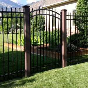 Trex Fence posts with ornamental arch top gate