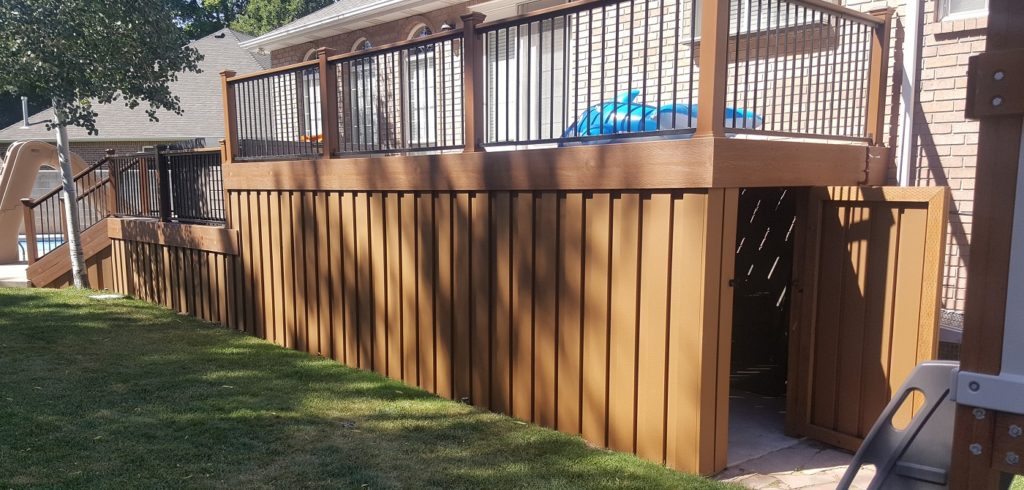 Fence Pickets Used to Create a Closed Off Space Under a Trex Deck