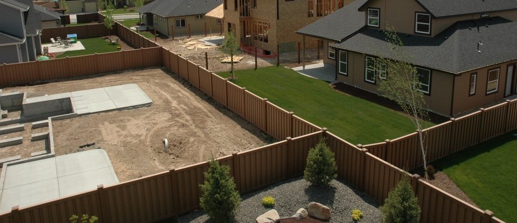 Fenced backyards in new housing development