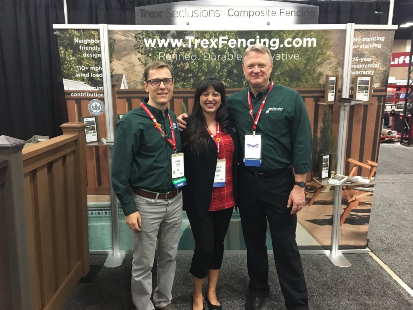 Staff members in the Trex Fencing booth at Fencetech 2017 in San Antonio